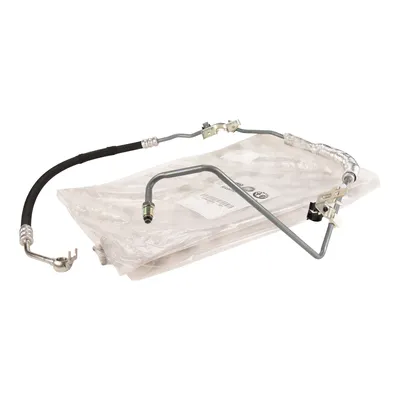 Hose system inlet for the power steering