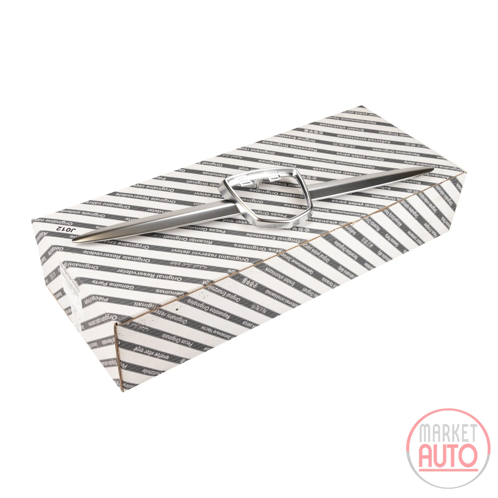 Trim strip for the front bumper model emblem