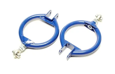 Upper wishbone rear axle adjustable for camber adjustment. Nissan