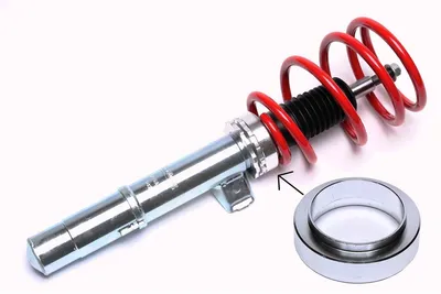 Aluminium adapter for height adjustment of coil spring struts.