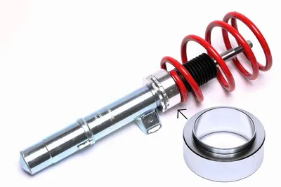 Aluminium adapter for height adjustment of coil spring struts.
