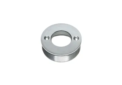 Lock nut for strut housing