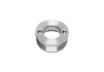 Lock nut for strut housing